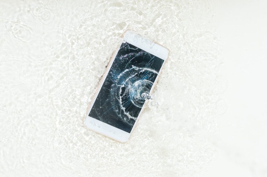 Cell phone submerged in water