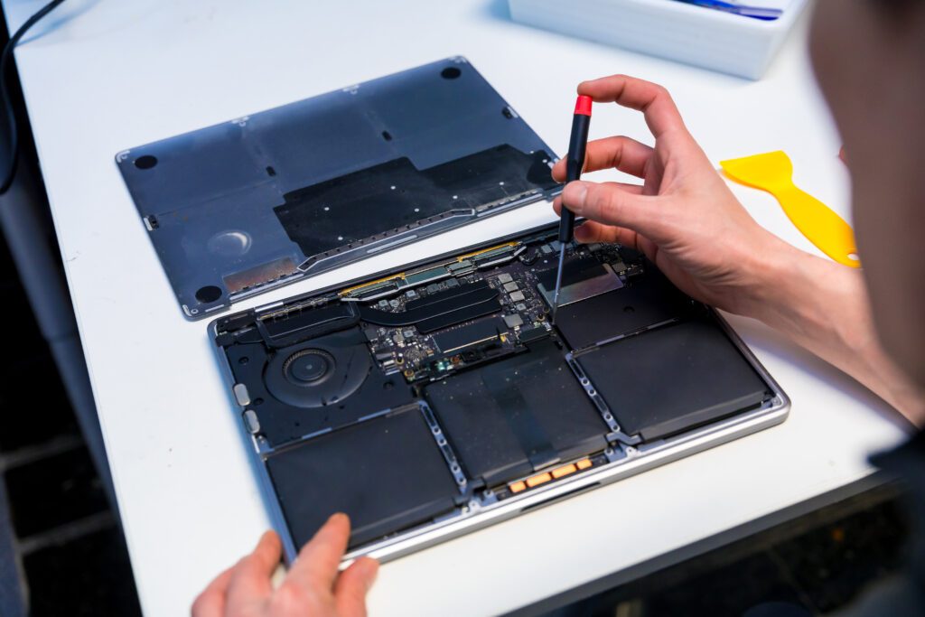 computer repair shop fixing laptop