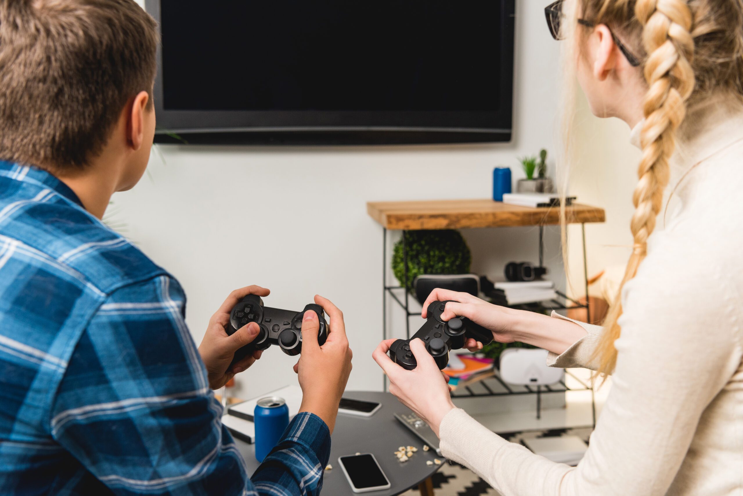 Kelowna kids playing repaired game console